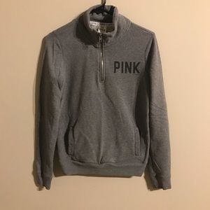 Grey pull over sweatshirt.